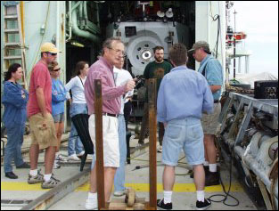 Scientists clustered around Argo II. Photo by Monte Basgall. Nicholas School of the Environment, Duke University.
