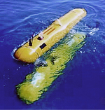 Yellow side-scan sonar device in the water.